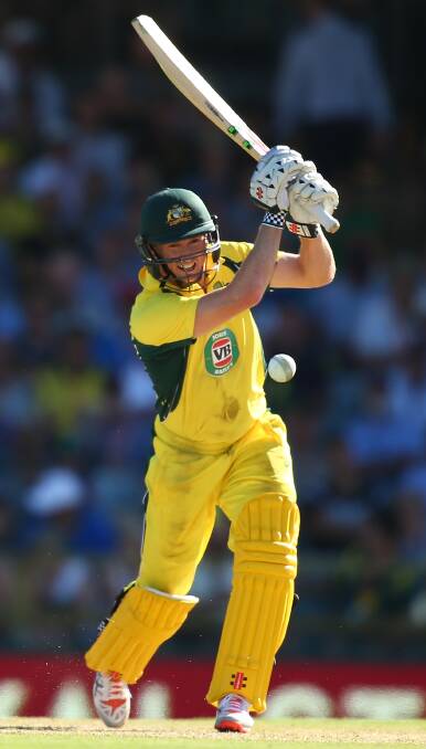 Drive time: George Bailey hit a match-saving 70, off 99 deliveries, to lead Australia to a One Day International victory over Sri Lanka. Picture: Getty Images