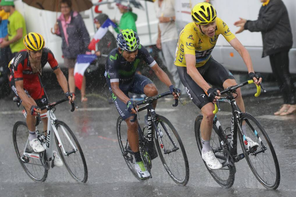 Raining champions: Richie Porte shadows Nairo Quintana and Chris Froome in last year's Tour de France. Pictures: Getty Images