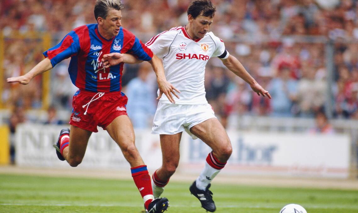 Flashback: Crystal Palace player Alan Pardew challenges Manchester United's Bryan Robson during the 1990 FA Cup final. Pardew is set to return for the 2016 rematch as Palace manager. Picture: Getty Images