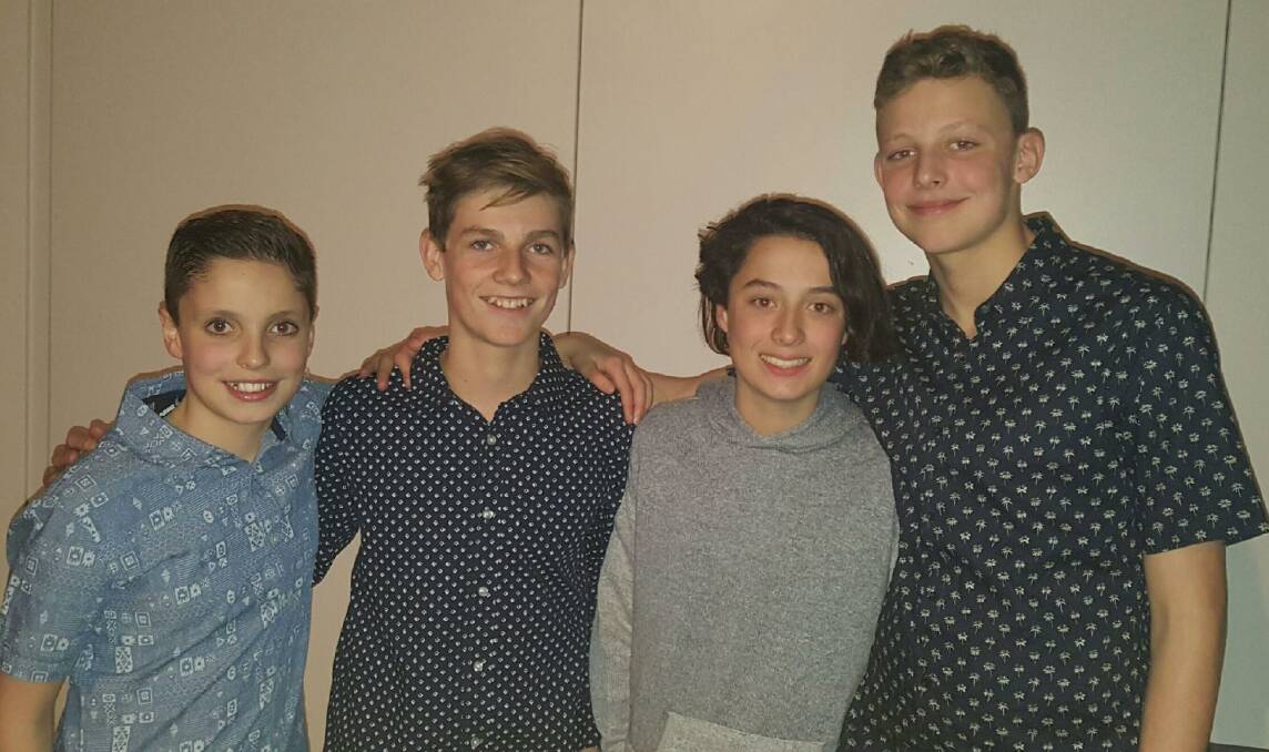 Clubmates: Swimmers Kane Johnson, 12, Mitchell Edmunds, 13, Malachi Wallis, 13, and Hugh Dolle, 12, at the South Esk gala awards dinner.