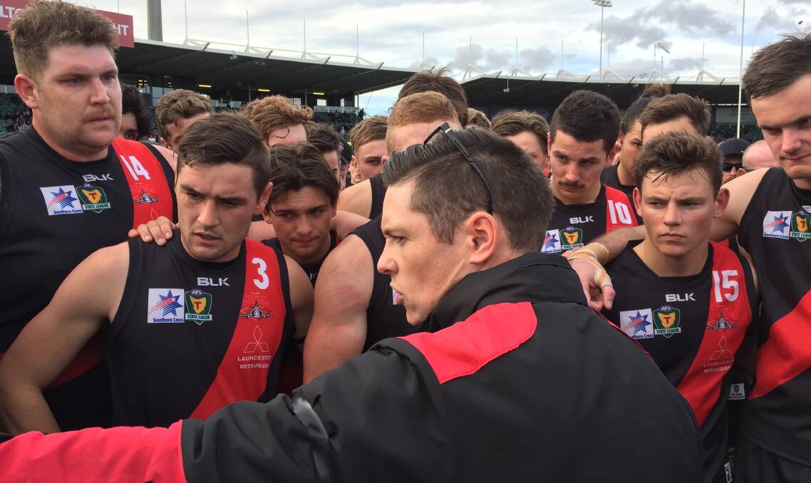 Focused: North Launceston coach Zane Littlejohn rallies his troops at three-quarter time in the State League grand final against Glenorchy. Picture: Rob Shaw