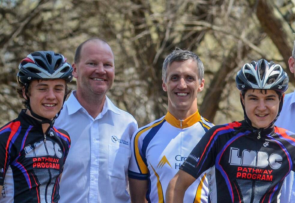 Team support: Sam Fox and Alex Lack with Michael Hudson and Zach McArthur at the 2014 launch of Launceston Mountain Bike Club's junior development group.