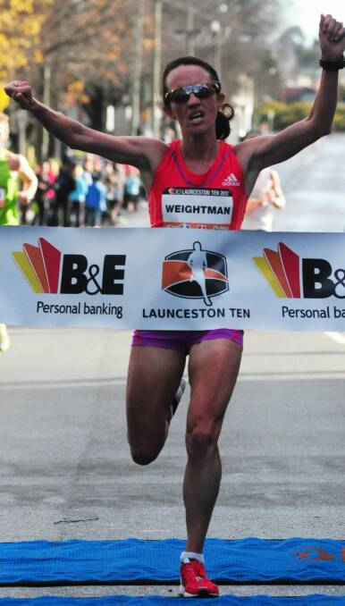 ACROSS THE LINE: Two-time Olympian Lisa Weightman is set to return for next weekend's Launceston 10 after winning the event three times, including in 2012.