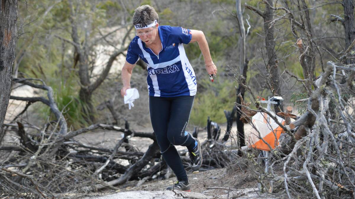 Victorian Jenny Bourne competing in the Tasmanian orienteering championships at St Helens in 2014.
