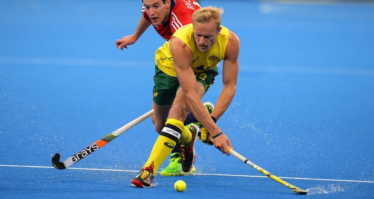 Captain's call: Tim Deavin captaining Australia against Great Britain during the FIH Champions Trophy in London earlier this month. Picture: Getty Images