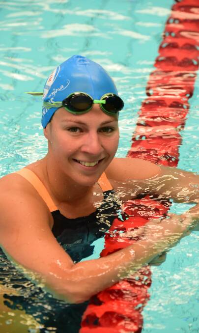 TOP DAY: Morgen Hawkins, of South Esk Swimming Club, is all smiles.