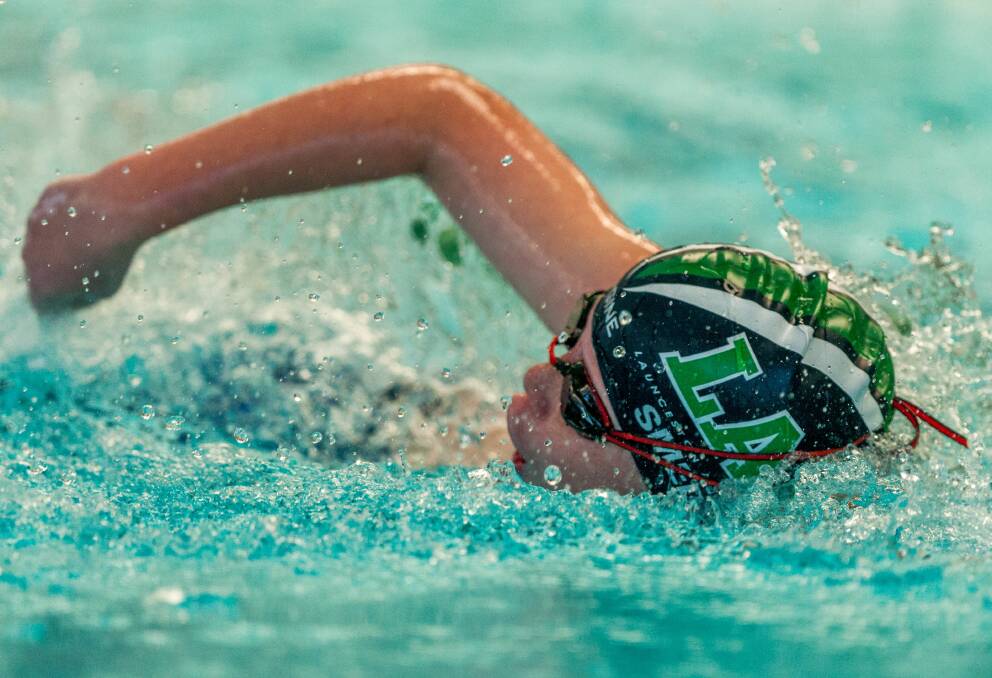 Making a splash: Isaac Smedley, of Launceston Aquatic Club, during his heat of the boys' 11 and under 50-metre freestyle. Pictures: Phillip Biggs