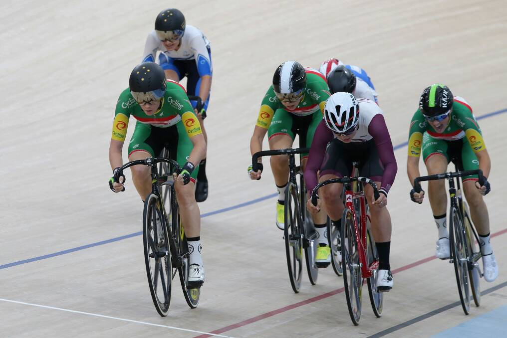 Domination: Tasmanians Amy Cure, Georgia Baker and Macey Stewart finish first, third and fourth in the women's scratch race at the Australian track cycling championships in Brisbane. 