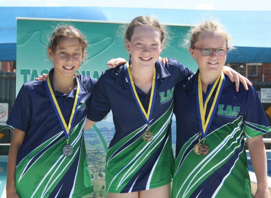 Clean sweep #2: Launceston Aquatic's Jasmine Irani, Emily Mitchell and Grace Campbell in the 11 girls' 33m freestyle.