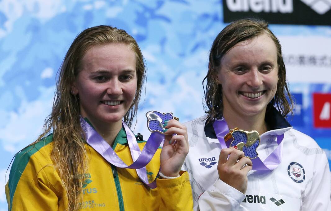 Silver lining: Ariarne Titmus with her silver medal after finishing behind Katie Ledecky in the 400m freestyle at the Pan Pacific championships in August. Picture: AP