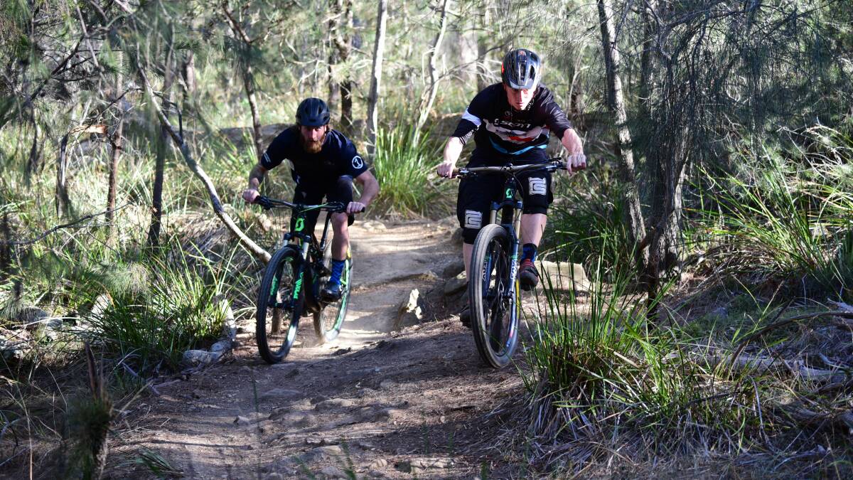 On track: Dylan Calow and Stephen Matthews warm up for Sunday's Enduro World Series race with a training ride at Launceston's Kate Reed Reserve. Pictures: Paul Scambler
