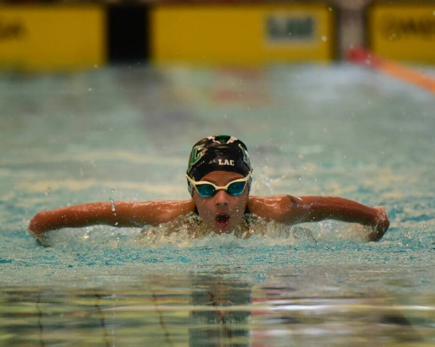 MADAM OF THE POOL: Jasmine Irani, of the Launceston Aquatic Club, surveys the lane in her butterfly race at the Northern Regional Championship.