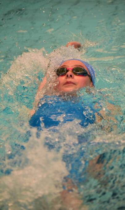 LYING BACK: Charlotte Pilsbury-Milne, of South Esk, focuses on the swim.
