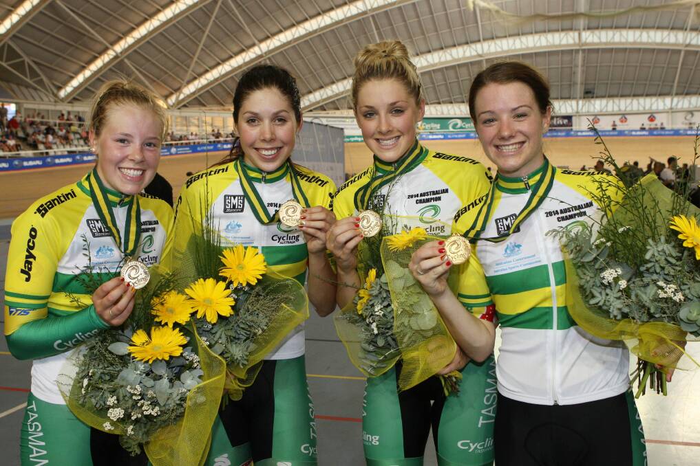 Team triumph: Tasmanian cyclists Lauren Perry, Georgia Baker, Macey Stewart and Amy Cure celebrate their team pursuit win at the 2014 track national championships.