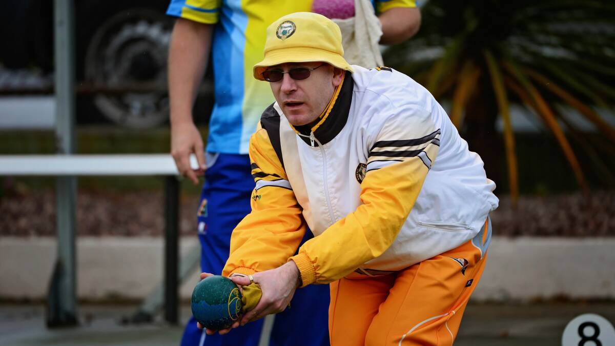 Lining up: Burnie bowler Mark Nitz takes aim on Sunday during a tense final-12 game.