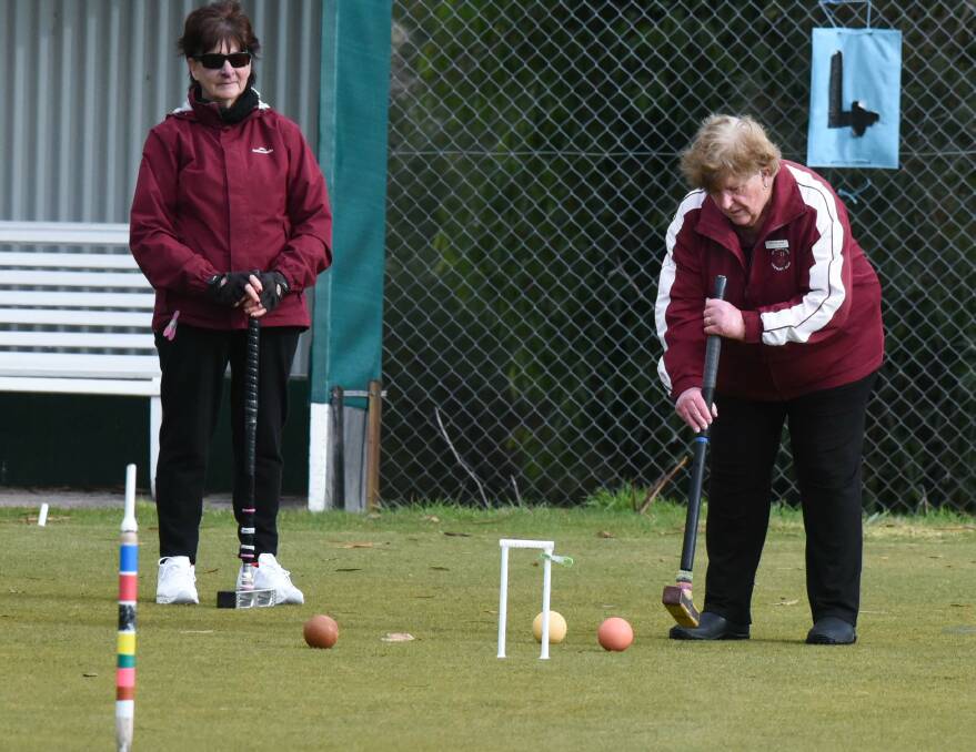 Top shot: St Leonards pair Chris Russell and Joan Williams during their semi-final at the golf croquet tournament. Pictures: Neil Richardson