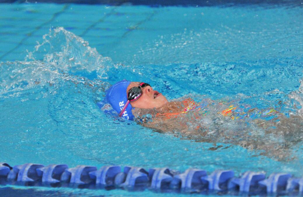 South Esk's Ella Fischer in the under-10 girls 50m backstroke.