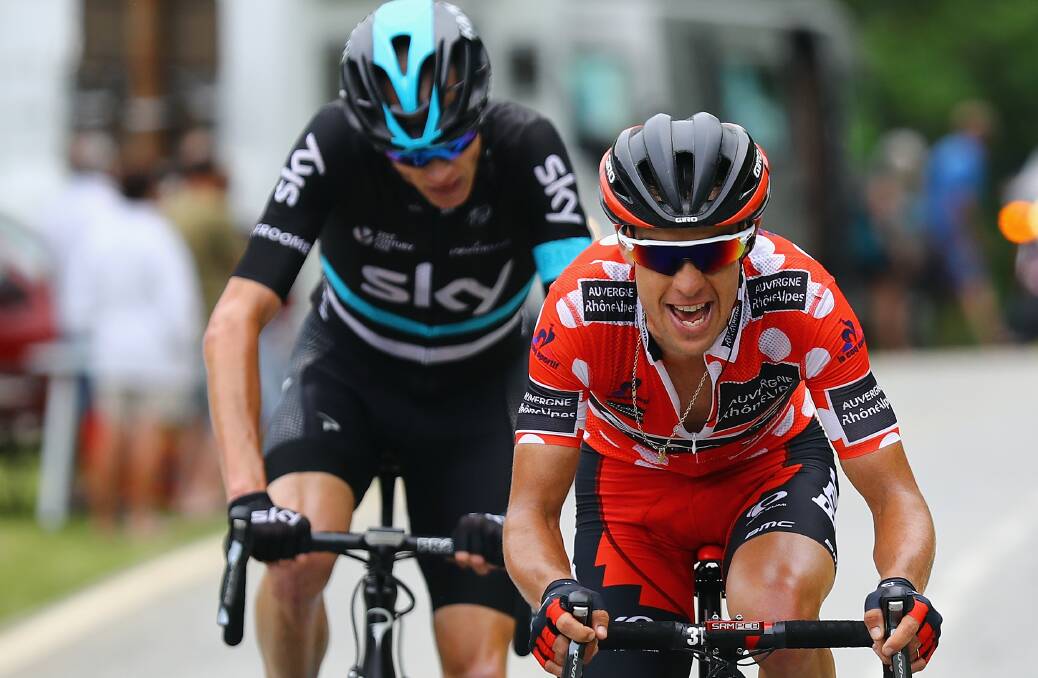 Keep up: Richie Porte challenging former teammate Chris Froome during the Criterium du Dauphine in France last month.