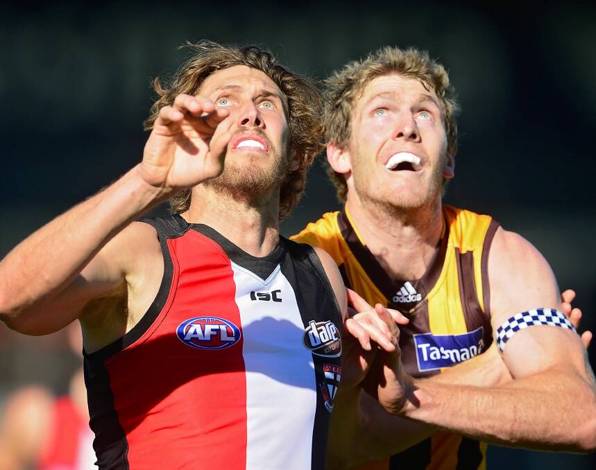 Reach for the sky: Hawk Ben McEvoy, taking on his old teammate Tom Hickey, of St Kilda, at Aurora Stadium in April. Picture: Phillip Biggs