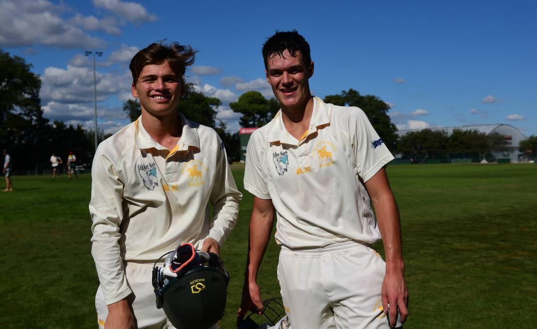 Teammates: South Launceston's Charlie Eastoe and Alec Smith walk off after the Cricket North grand final on Sunday. Picture: Paul Scambler