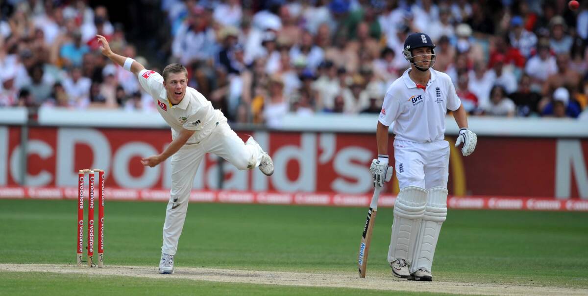 Peak: Xavier Doherty bowls to Alastair Cook as Jonathan Trott backs up during the First Ashes Test at the Gabba, Brisbane, in November 2010. Picture: Will Swan
