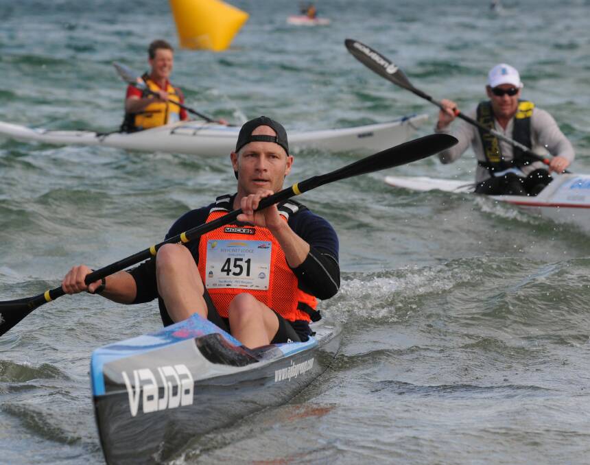 Choppy waters: Paul Murphy competing in the kayak leg of the 2013 Freycinet Challenge at Coles Bay. Picture: Paul Scambler