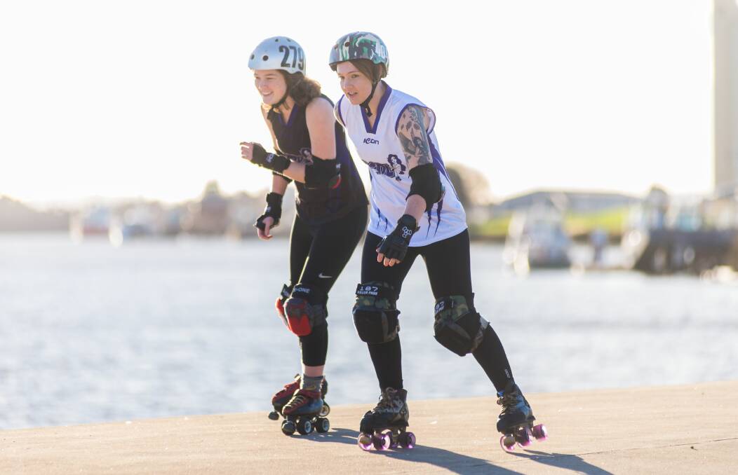 RIVALS Megan 'JP' O'Donnell-Bennetts, of South Launceston, with Samara 'Rambo Sambo' Digney, of Newstead, will play off against each other in a roller derby showdown on Saturday. Picture: Phil Biggs