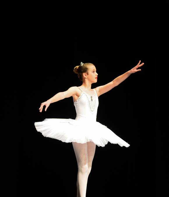 DANCE: Performer Charlotte Wigg on stage during the under 12 Launceston Competitions Class 536 Restricted Classical Solo. Picture: Phillip Biggs