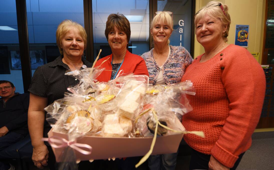 FOR HENRY: Annie Clancy, Catherine Noble, Christine Shepherd and Linda Irwin with some of the treats they baked to raise money for the Launceston RSPCA. Picture: Scott Gelston