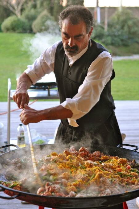 Director of Casa Paella and the paella ambassador to the Pacific region, Edrick Corban-Banks cooking up his award winning paella. Picture supplied.