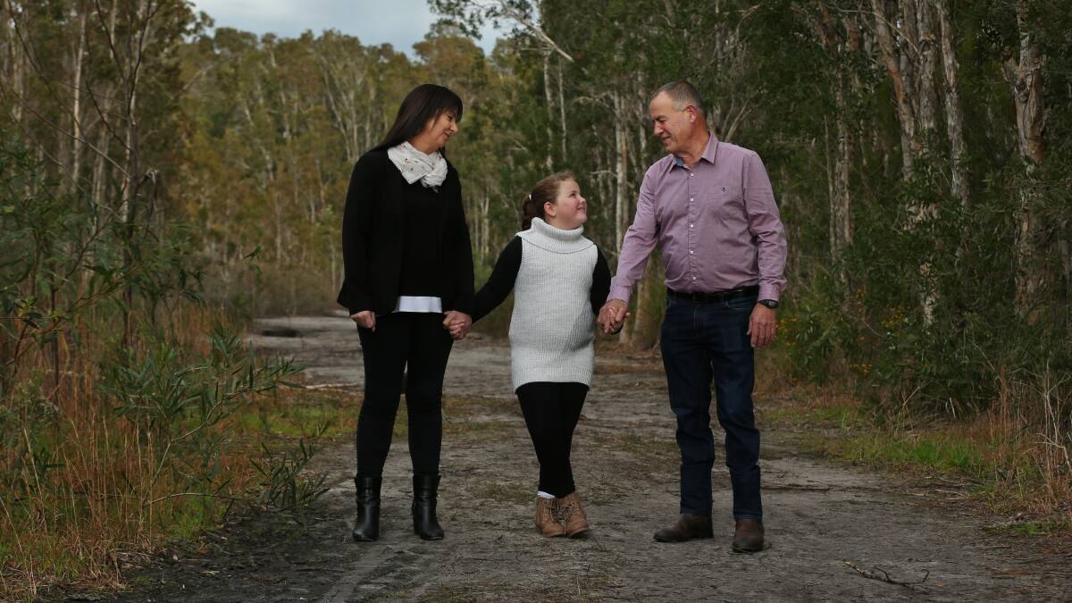 NO EASY ROAD: Carolyn and Ian Thomson, pictured with seven-year-old daughter Bessie, say their daughter Riharna's decision to be an organ donor offered some solace from their grief. Picture: Simone De Peak