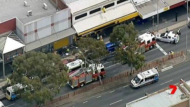 Emergency services outside the Commonwealth Bank in Springvale. Photo: Courtesy of Seven News