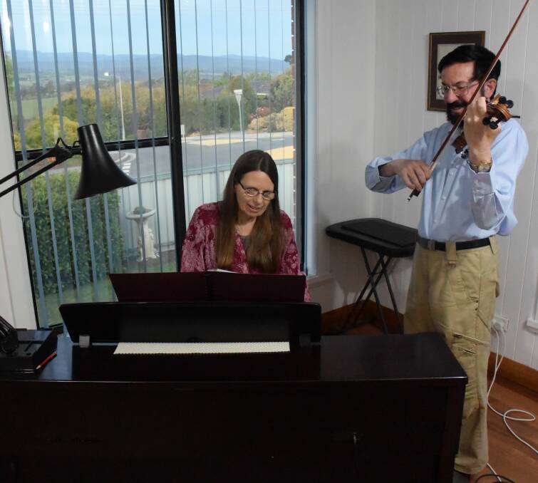 FREE CONCERT: Jane Fleming and Wayne Madden practice for the Kepler Ensemble Concert on Saturday. Picture: Toli Papadopoulos 