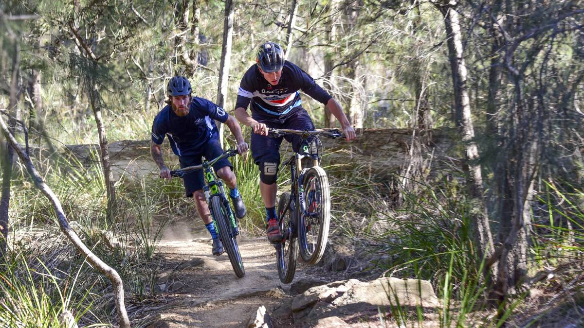 Dylan Calow and Stephen Matthews warm up for Sunday's Enduro World Series race with a training ride at Launceston's Kate Reed Reserve. Pictures: Paul Scambler