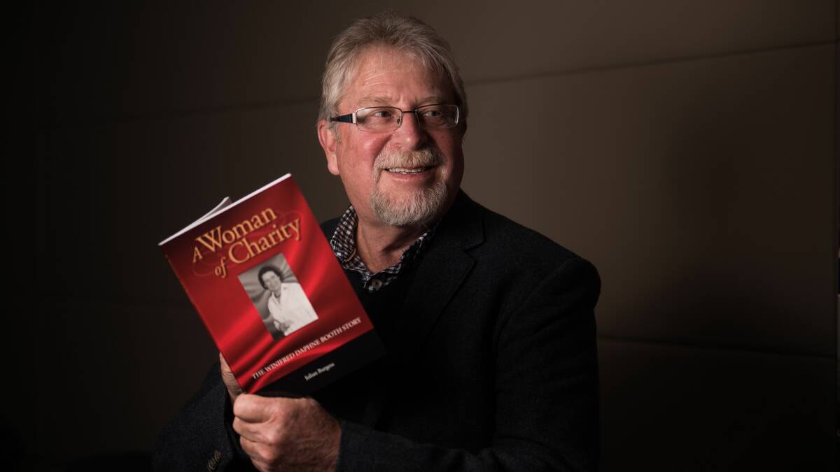 CHRONICLE: Launceston author Julian Burgess with his new book about one of the city's recognised socialites WD Booth. Picture: Scott Gelston