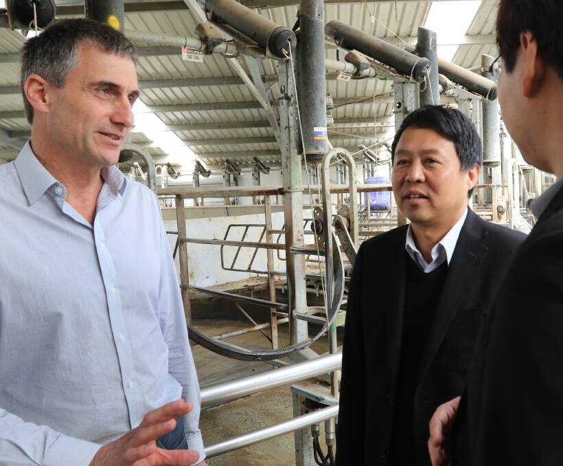 GAME CHANGER: VDL owner Lu Xianfeng and director David Beca at Woolnorth in January when Mr Lu visited the site prior to the sale being finalised. The company has unveiled plans to make fresh milk for the Chinese market.