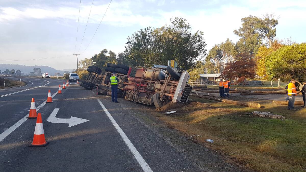 A log truck rolled on the West Tamar Highway near the Tamar Valley Christian Church on Thursday morning.