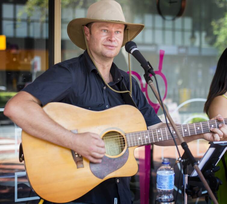 COUNTRY PASSION: Musician David Lee has been participating at the Tamworth Country Music Festival, busking on the streets of New South Wales. Picture: supplied.