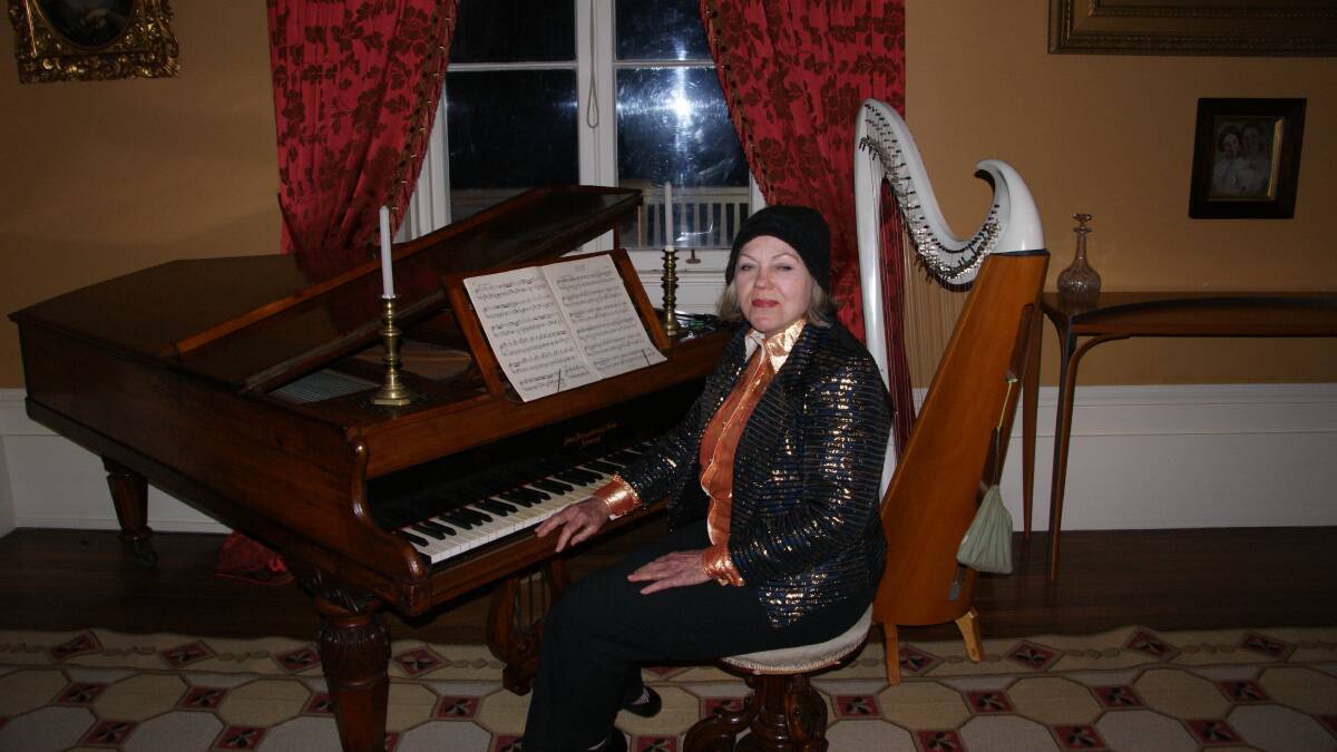 Tinkling the ivories for the Rural Business Tasmania event is Sandra Petersen on piano and harp.