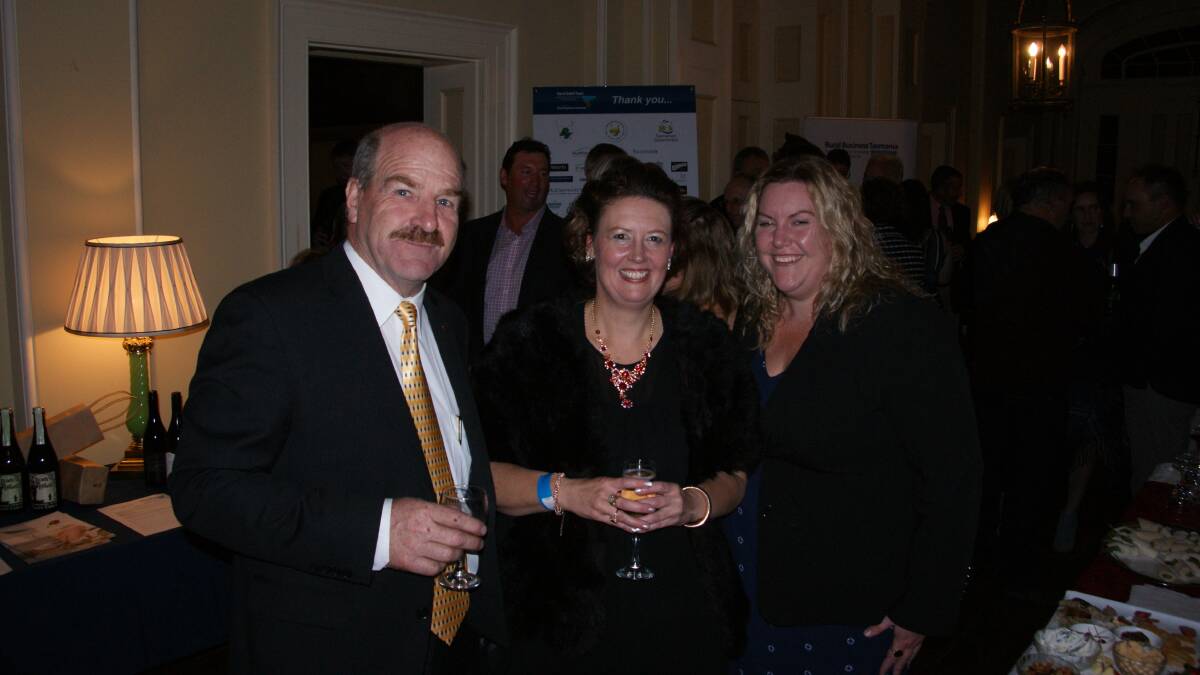 Lyons MHA Mark Shelton at the fundraiser with Rural Business Tasmania chief executive Elizabeth Skirving and Laura Richardson.