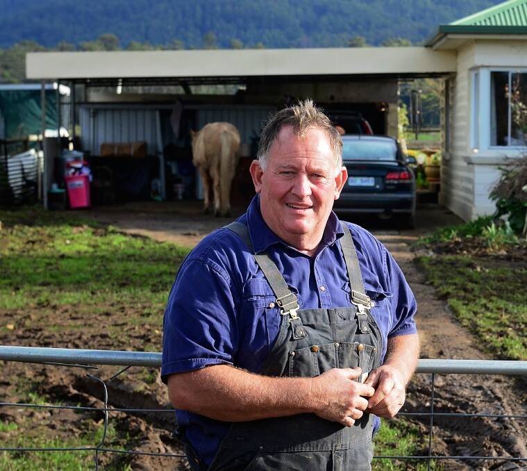 DESTROYED: Latrobe dairy farmer Michael Perkins, whose farm has been damaged by river rocks. Picture: Phillip Biggs.