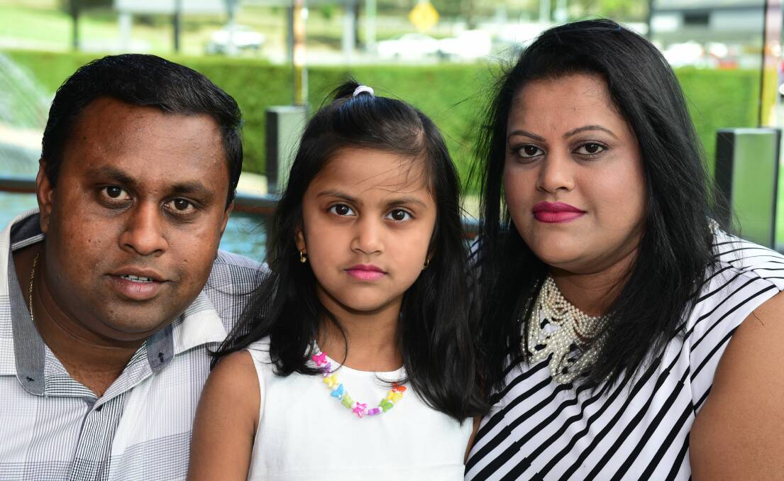 NEW HOME: Anesh Chand, Pranesha Chand, 6, and Pritika Chand, who will become citizens on Thursday in Launceston. Picture: Paul Scambler 