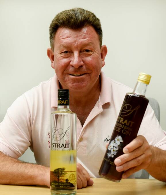 BENCHMARK WIN: Strait Brands managing director Philip Ridyard with the company's dry gin, that was a silver winner at the Melbourne International Spirits Competition. 