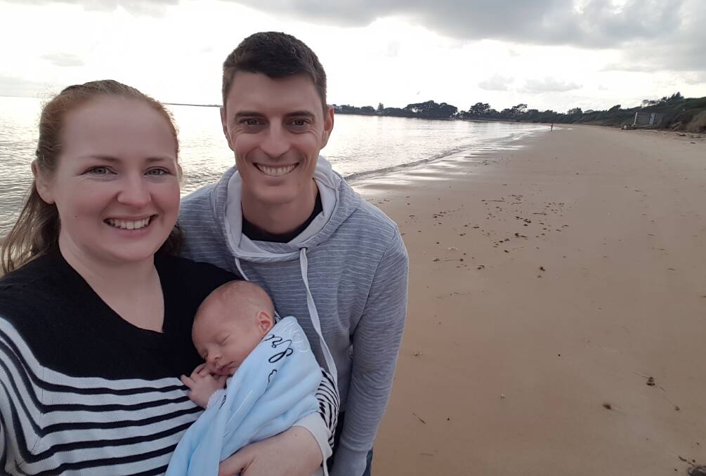 Sea change: Amanda, Mitch and baby Liam Clifford have settled at George Town while Amanda pursues her new career as a doctor in general practice.