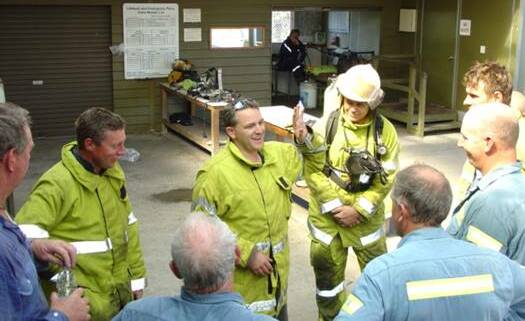 Debrief: SRTA Life Rescue director Marcus Walmsley debriefing the Bell Bay Aluminium Rescue team after a firefighting exercise.