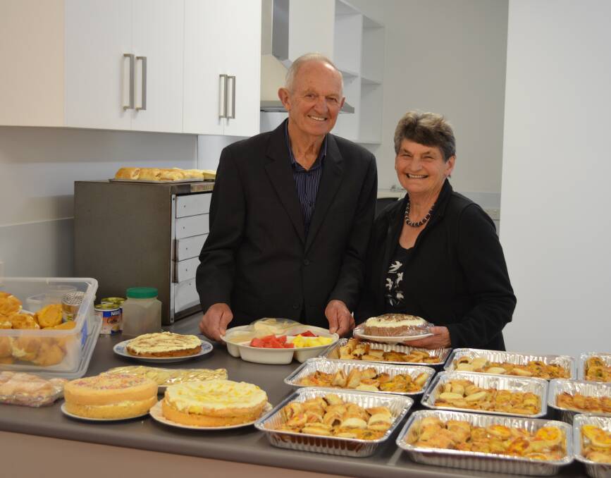 Super supper: Rosevale Memorial Hall Committee stalwarts Kevin and Gwen Cuthbertson help prepare supper for an old-time dance in the new hall kitchen. The old kitchen was more than 65 years old.
