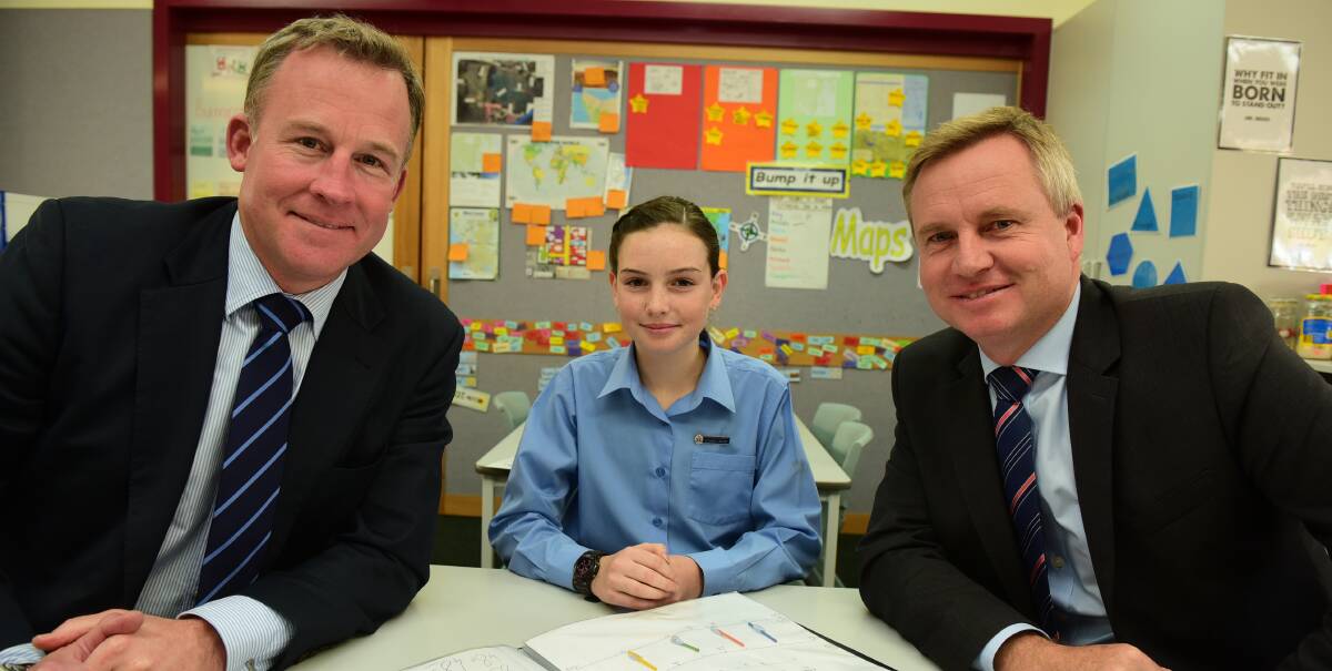 FUNDING: Premier Will Hodgman, Riverside Primary School pupil Renya Atkins, and Education Minister Jeremy Rockliff visit the primary school on Tuesday. Picture: PAUL SCAMBLER