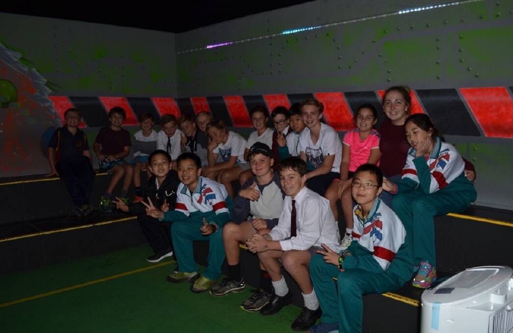 Together: Students from Launceston's Scotch Oakburn College and Beijing's Jinshan School at laser tag. Picture: Oscar Edwards