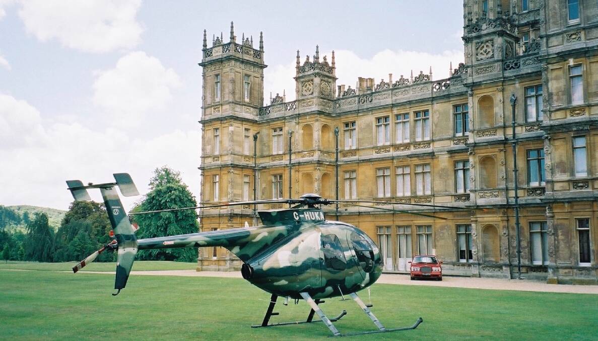 TRAVEL IN STYLE: A helicopter lands at Highclere Castle for a Starlight Foundation charity day. Picture: Supplied