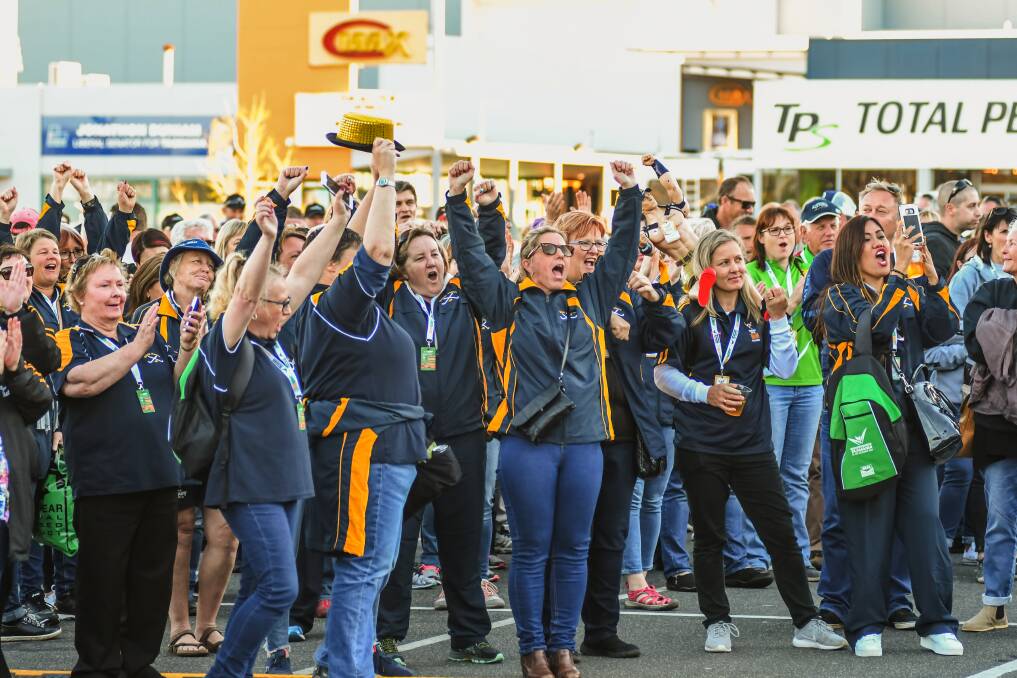 GRAND OPENING: Crowds in Devonport go wild after the 16th Australian Masters Games is officially declared open. Pictures: Phillip Biggs and Paul Scambler